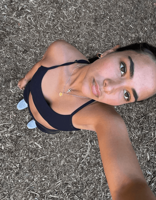 Girl taking selfie in workout gear
