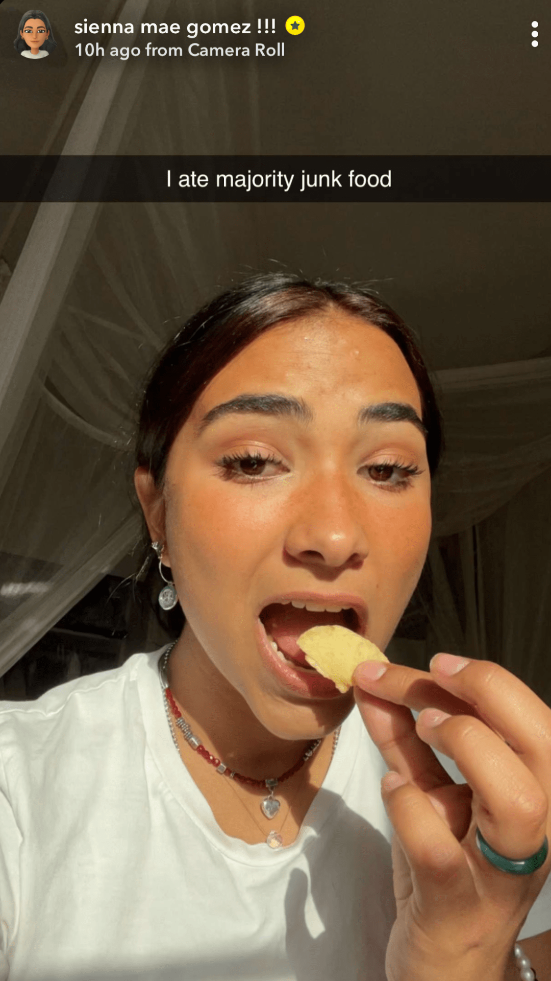 Girl eating potato chip